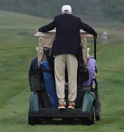 Doug_Miller_on_the_Back_of_a_Golf_Cart